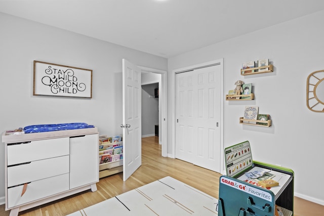3488 Elmendorf Way, Lexington, KY 40517 - rec room with light wood-style floors and baseboards