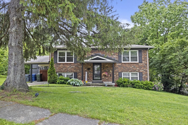 3488 Elmendorf Way, Lexington, KY 40517 - split level home featuring a front yard and brick siding