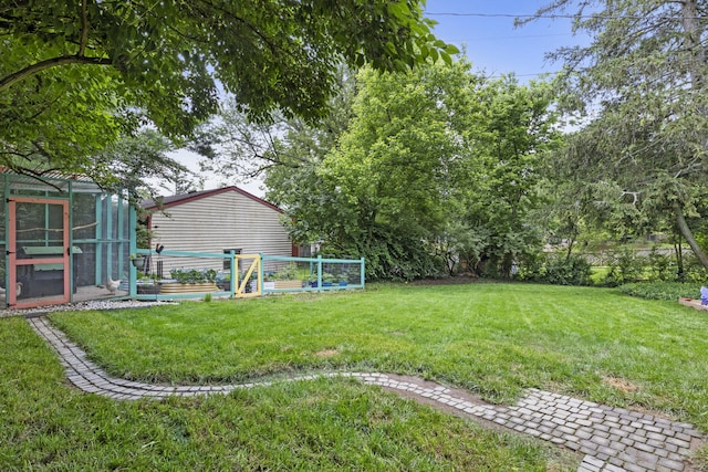 3488 Elmendorf Way, Lexington, KY 40517 - view of grassy yard featuring exterior structure and an outdoor structure