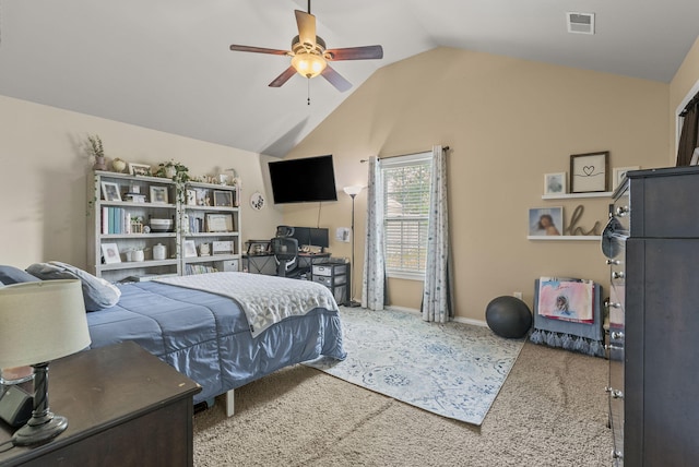 carpeted bedroom featuring lofted ceiling, ceiling fan, and baseboards
