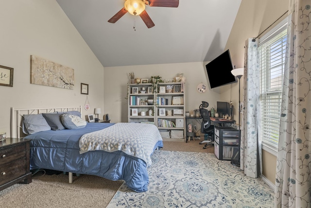 bedroom featuring vaulted ceiling, carpet floors, a desk, and ceiling fan