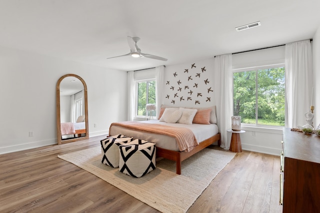 543 Laketower Dr Unit 140, Lexington, KY 40502 - bedroom with light wood finished floors, baseboards, and a ceiling fan