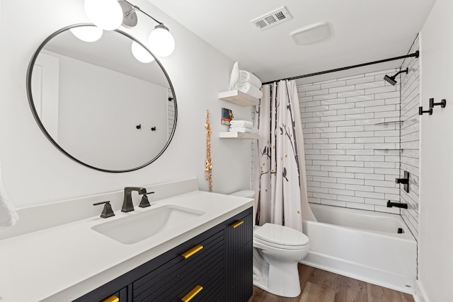 543 Laketower Dr Unit 140, Lexington, KY 40502 - full bathroom with toilet, wood finished floors, shower / bathtub combination with curtain, and vanity