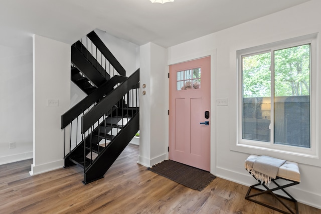 543 Laketower Dr Unit 140, Lexington, KY 40502 - entryway with stairs, wood finished floors, and baseboards