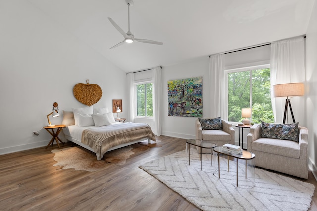 543 Laketower Dr Unit 140, Lexington, KY 40502 - bedroom featuring baseboards, wood finished floors, lofted ceiling, and a ceiling fan