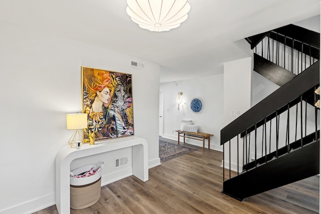 543 Laketower Dr Unit 140, Lexington, KY 40502 - foyer featuring stairs, wood finished floors, and baseboards