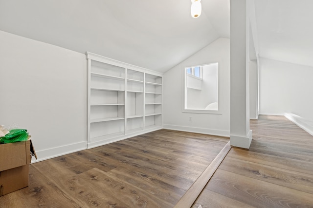 543 Laketower Dr Unit 140, Lexington, KY 40502 - additional living space featuring vaulted ceiling, wood finished floors, built in features, and baseboards