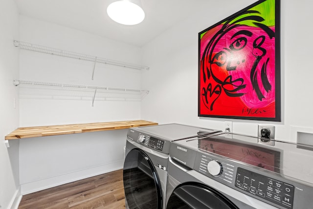 543 Laketower Dr Unit 140, Lexington, KY 40502 - laundry room featuring washer and dryer, wood finished floors, and baseboards