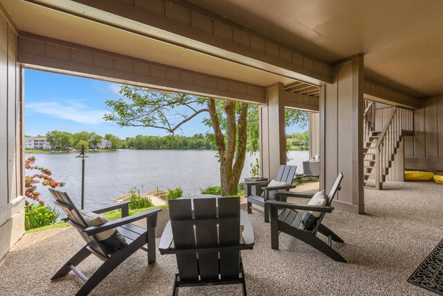 543 Laketower Dr Unit 140, Lexington, KY 40502 - view of patio with a water view and stairs
