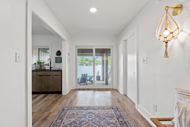 543 Laketower Dr Unit 140, Lexington, KY 40502 - entrance foyer featuring light wood finished floors, baseboards, and recessed lighting