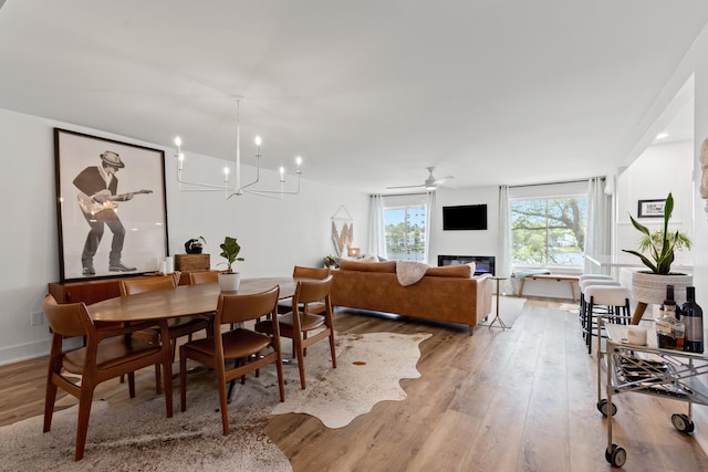 543 Laketower Dr Unit 140, Lexington, KY 40502 - dining space with light wood finished floors and a chandelier