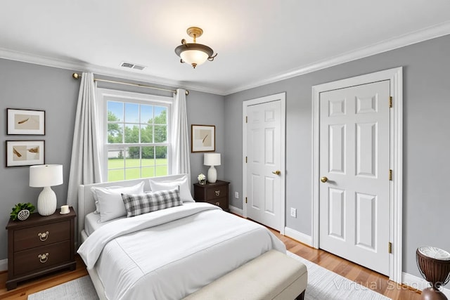 4301 Ravens Crest Ln, Lexington, KY 40515 - bedroom featuring light wood-style floors and ornamental molding