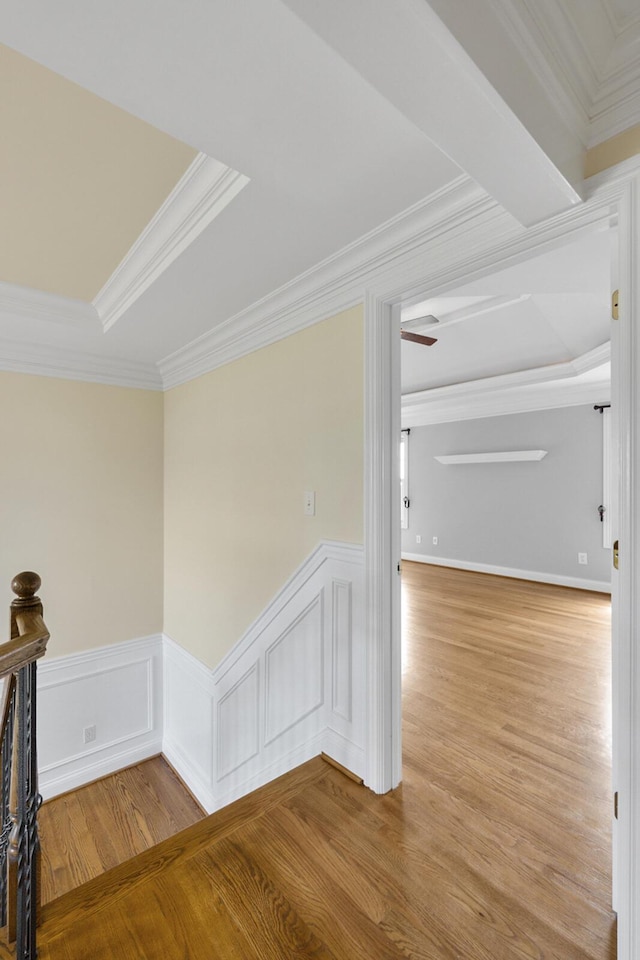4301 Ravens Crest Ln, Lexington, KY 40515 - corridor with ornamental molding, an upstairs landing, light wood-style floors, and wainscoting