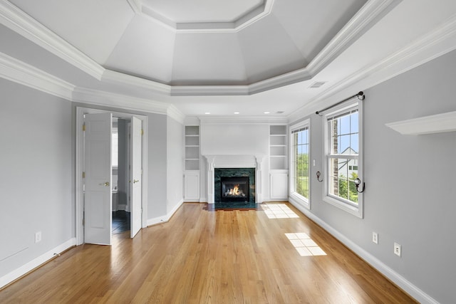 4301 Ravens Crest Ln, Lexington, KY 40515 - unfurnished living room with light wood finished floors, a fireplace, baseboards, and crown molding
