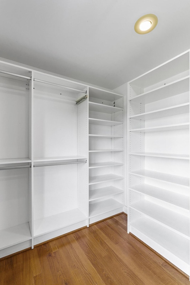 4301 Ravens Crest Ln, Lexington, KY 40515 - walk in closet with wood finished floors