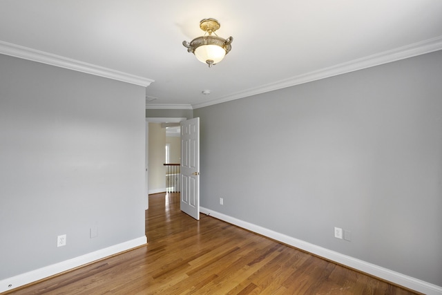 4301 Ravens Crest Ln, Lexington, KY 40515 - empty room with baseboards, wood finished floors, and ornamental molding