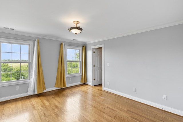 4301 Ravens Crest Ln, Lexington, KY 40515 - spare room with crown molding, baseboards, and light wood-type flooring
