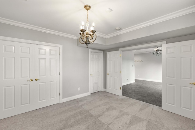 4301 Ravens Crest Ln, Lexington, KY 40515 - unfurnished bedroom featuring carpet floors, a chandelier, ornamental molding, baseboards, and a closet