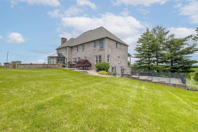4301 Ravens Crest Ln, Lexington, KY 40515 - back of property featuring a chimney and brick siding