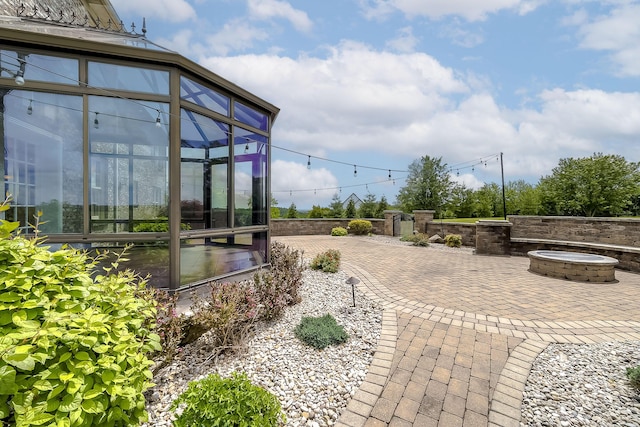 4301 Ravens Crest Ln, Lexington, KY 40515 - view of patio with an outdoor fire pit