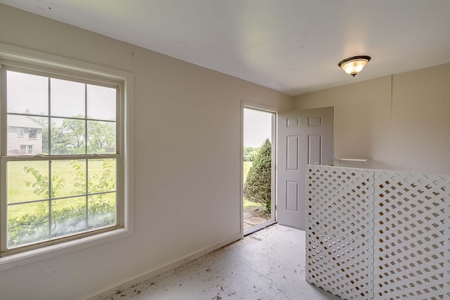 4301 Ravens Crest Ln, Lexington, KY 40515 - foyer featuring unfinished concrete flooring and baseboards