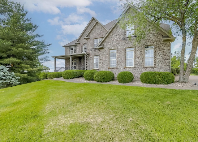 4301 Ravens Crest Ln, Lexington, KY 40515 - view of front facade featuring a front lawn and brick siding