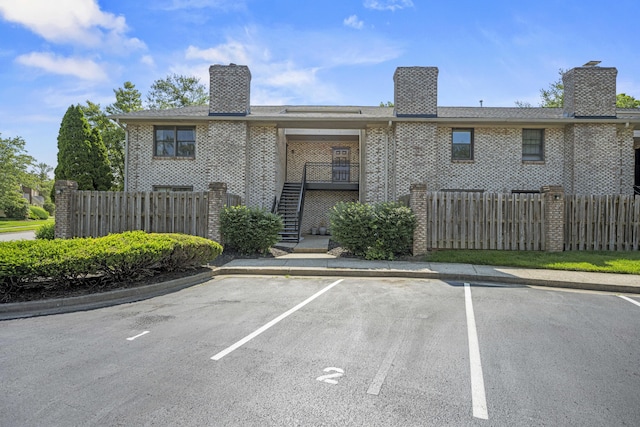 1117 Turkey Foot Rd Unit 6, Lexington, KY 40517 - view of building exterior with uncovered parking and stairway