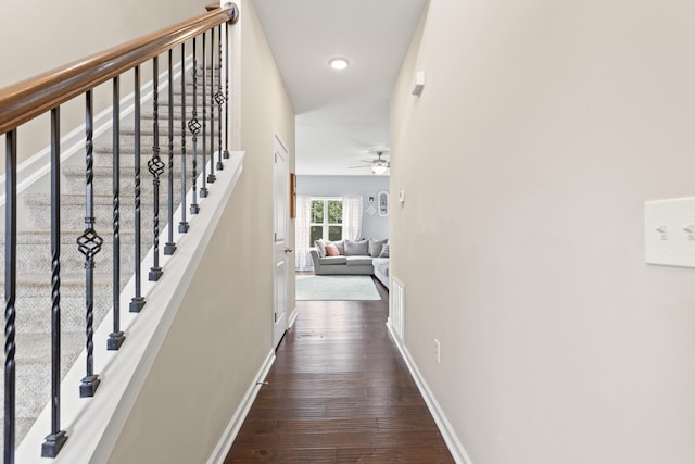 2768 Red Clover Ln, Lexington, KY 40511 - hallway with baseboards, dark wood-style flooring, and stairway