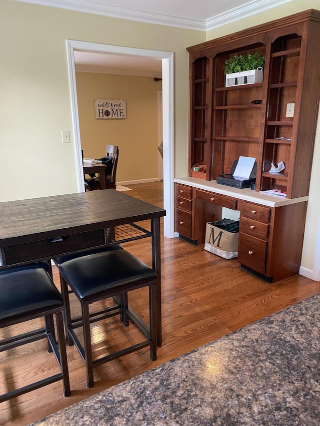 319 Huckleberry Ln, London, KY 40744 - dining area featuring crown molding, wood finished floors, an office area, and baseboards
