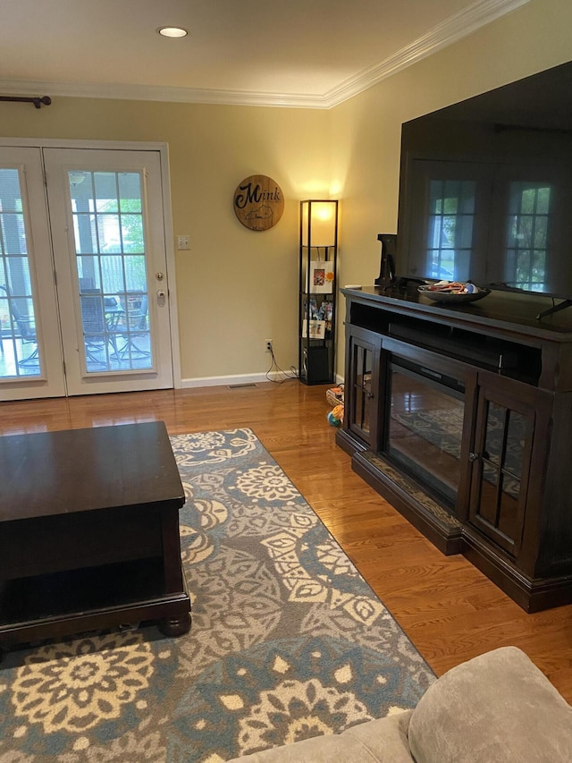 319 Huckleberry Ln, London, KY 40744 - living area featuring ornamental molding, wood finished floors, and baseboards