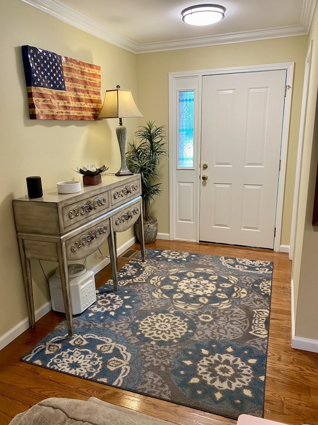 319 Huckleberry Ln, London, KY 40744 - foyer entrance featuring wood finished floors, ornamental molding, and baseboards
