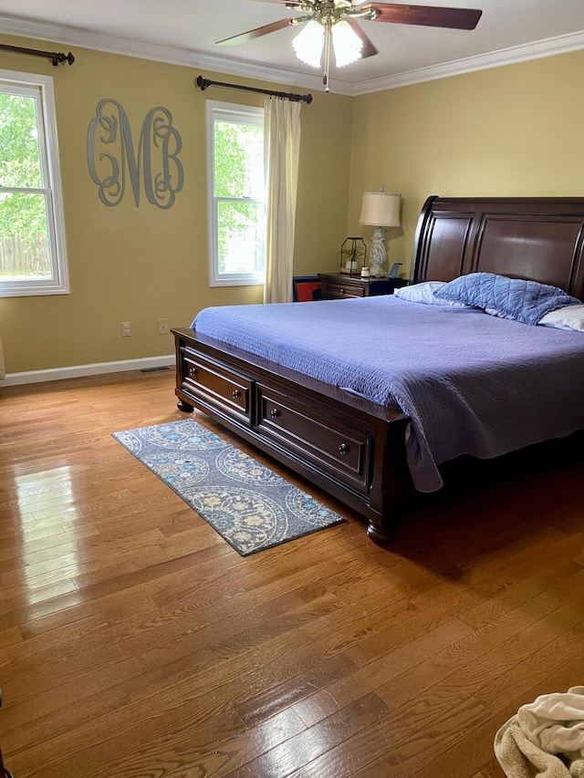319 Huckleberry Ln, London, KY 40744 - bedroom with light wood-style flooring, crown molding, baseboards, and a ceiling fan