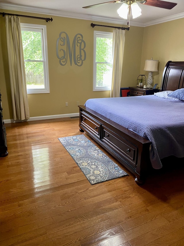 319 Huckleberry Ln, London, KY 40744 - bedroom featuring light wood-style flooring, crown molding, baseboards, and ceiling fan