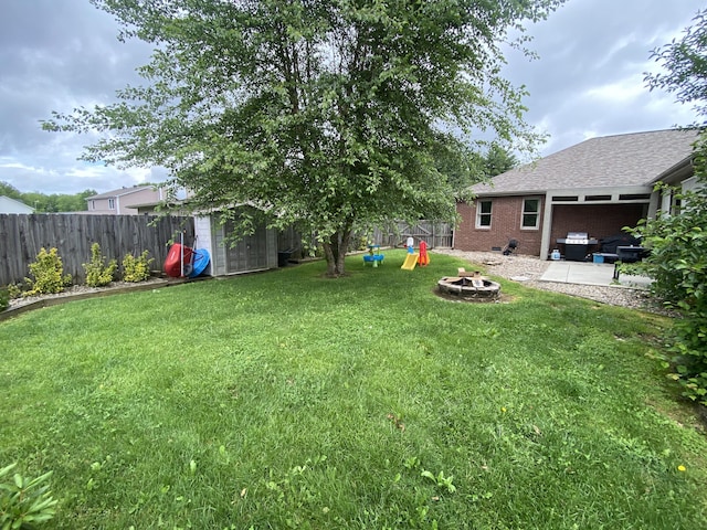 319 Huckleberry Ln, London, KY 40744 - view of yard with an outdoor fire pit and a patio