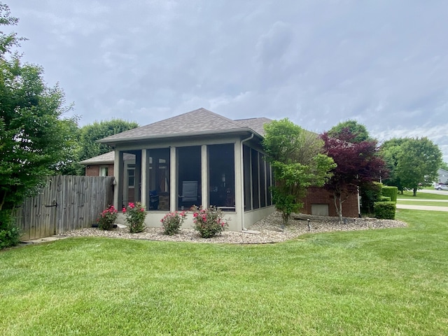 319 Huckleberry Ln, London, KY 40744 - back of property with a sunroom and a shingled roof