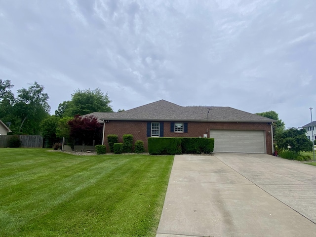 319 Huckleberry Ln, London, KY 40744 - ranch-style home featuring brick siding, a garage, concrete driveway, and a shingled roof
