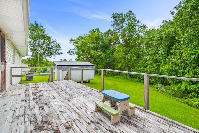 wooden deck with a lawn and central air condition unit