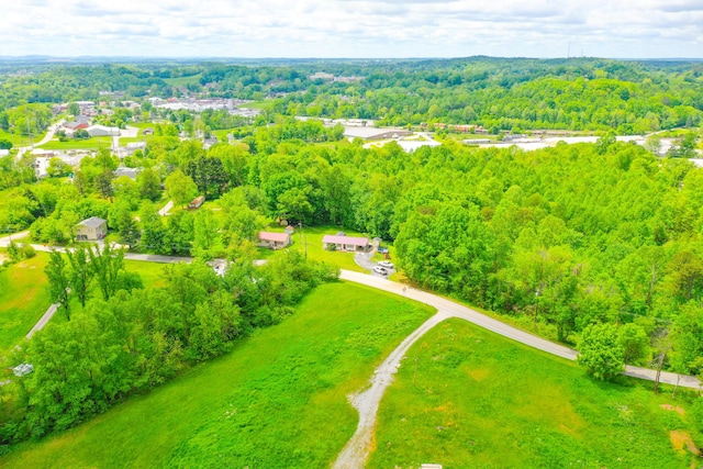 drone / aerial view of a heavily wooded area