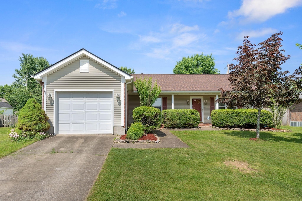 118 Brookwood Ln, Wilmore, KY 40390 - single story home featuring concrete driveway, an attached garage, and a shingled roof