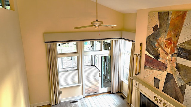 1667 Snow Goose Cir, Lexington, KY 40511 - foyer featuring wood finished floors, vaulted ceiling, a ceiling fan, and baseboards