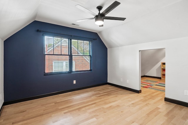 252 Cochran Rd, Lexington, KY 40502 - additional living space with vaulted ceiling, a ceiling fan, wood finished floors, and baseboards