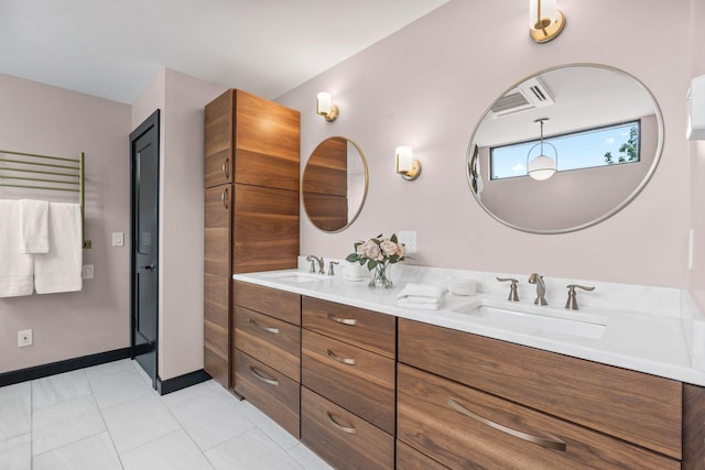 252 Cochran Rd, Lexington, KY 40502 - bathroom with double vanity and baseboards