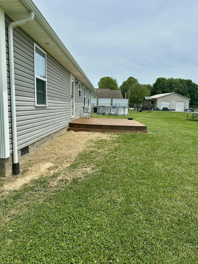 41 Logan Ln, London, KY 40744 - view of green lawn with a deck