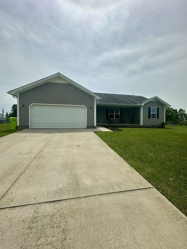 41 Logan Ln, London, KY 40744 - ranch-style house with concrete driveway, a front lawn, and a garage