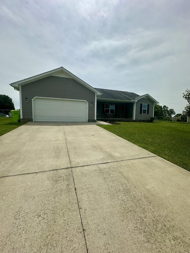 41 Logan Ln, London, KY 40744 - ranch-style home featuring driveway, a garage, and a front yard