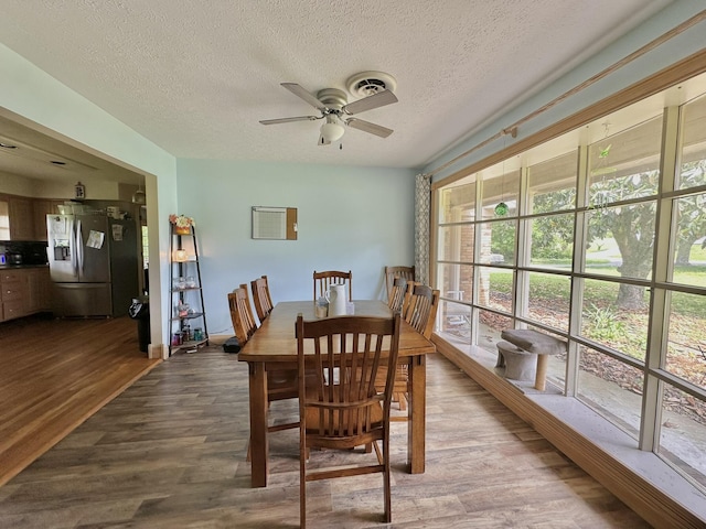 3125 Old Bull Rd, Eubank, KY 42567 - dining room with ceiling fan, dark wood-style floors, and a textured ceiling