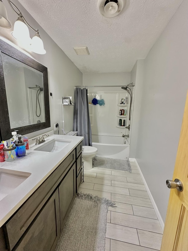 3125 Old Bull Rd, Eubank, KY 42567 - full bath featuring toilet, shower / bath combination with curtain, double vanity, and a textured ceiling