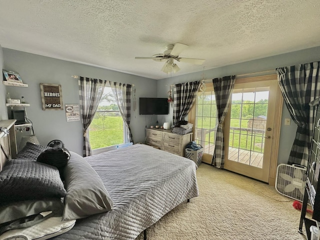 3125 Old Bull Rd, Eubank, KY 42567 - bedroom featuring access to outside, light colored carpet, a textured ceiling, and a ceiling fan