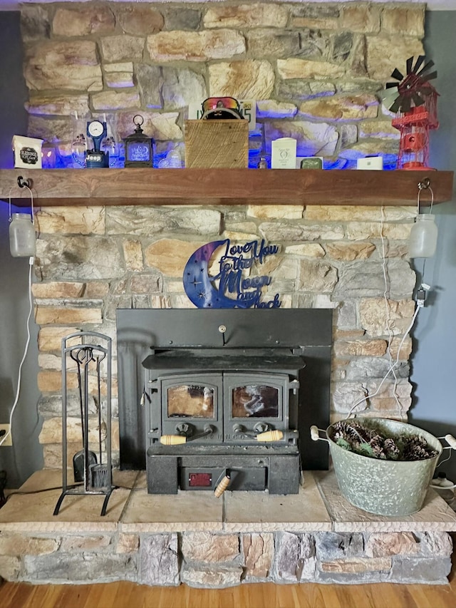 3125 Old Bull Rd, Eubank, KY 42567 - detailed view of a wood stove and wood finished floors