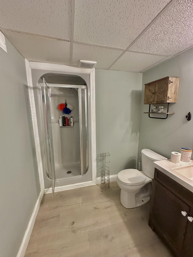 3125 Old Bull Rd, Eubank, KY 42567 - full bath featuring a drop ceiling, a shower stall, vanity, toilet, and baseboards